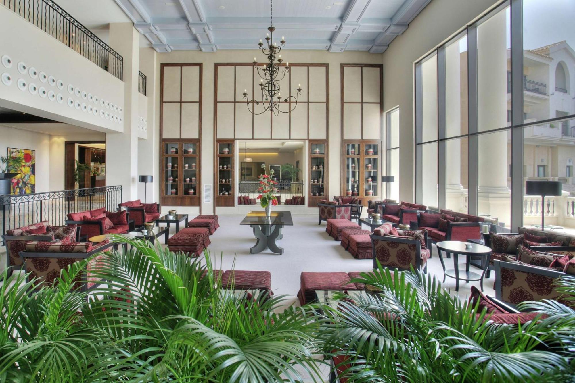 Doubletree By Hilton La Torre Golf Resort Roldán Exterior foto The lobby of the hotel